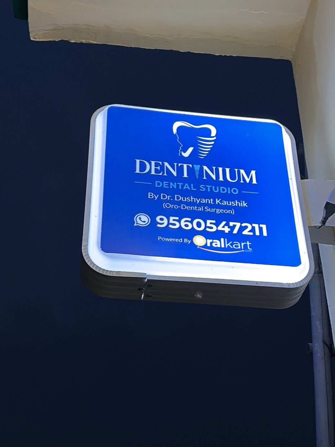 Look for the blue signboard.