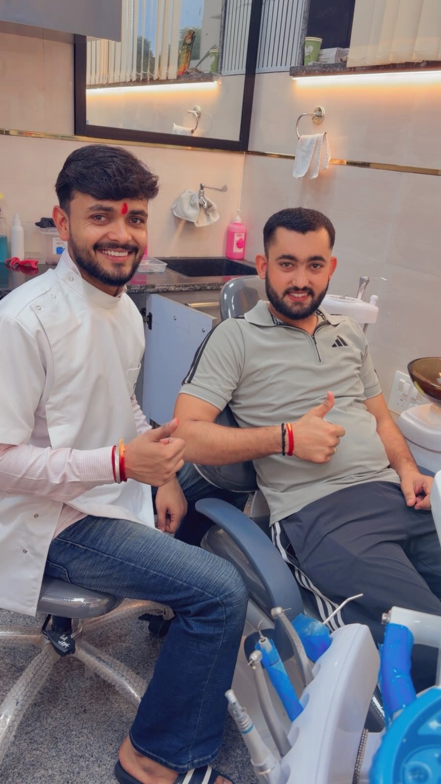 Dr. Dushyant Kaushik with a happy patient after treatment